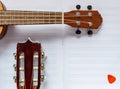 Hawaiian guitar and acoustic Guitar neck and strings. Musical instruments ideal for learning to play. Music and sheet music. Music