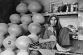 Gujarat: Old indian woman selling terracota mugs in Ahmedabad City