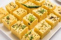 Gujarati Khaman Dhokla or Steamed Gram Flour Puffy Snack Cake Royalty Free Stock Photo