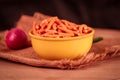 Gujarati local food Gadhiya with green pepper chili on wooden table,Chivda, Farsan, Namkin Royalty Free Stock Photo