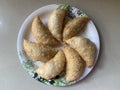 Gujiya or gujia or karanji - sweet dumplings. ndian snack made on diwali, holi and for celebrations .