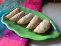 Gujiya or gujia or karanji - sweet dumplings. ndian snack made on diwali, holi and for celebrations .