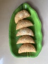 Gujiya or gujia or karanji - sweet dumplings. ndian snack made on diwali, holi and for celebrations .