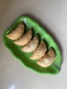 Gujiya or gujia or karanji - sweet dumplings. ndian snack made on diwali, holi and for celebrations .