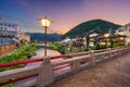 Gujo Hachiman, Japan hot springs town at dusk over the Yoshida River.