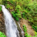 The Guk waterfall on the Zhenets river in the Carpathians. Waterfall on a mountain river Royalty Free Stock Photo