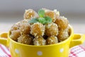 Gulab jamun in yellow bowl