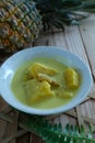 Gulai Nenas ikan masin  or Coconut milk with pineapples on white plate Royalty Free Stock Photo
