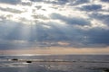The Gulf of Finland before sunset, the rays of the sun pass through the overcast sky Royalty Free Stock Photo