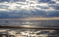 The Gulf of Finland before sunset, the rays of the sun pass through the overcast sky Royalty Free Stock Photo