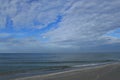 Gulf of Mexico beach and clearing clouds after sunrise