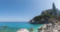 Gulf of Orosei, Sardinia, Italy, September 17, 2020: Panoramic view of Cala Goloritze beach with tourist people