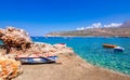 The gulf outside of the amazing caves of Dirou with fishing boats and turquoise waters, Peloponnese.