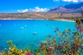 The gulf outside of the amazing caves of Dirou with fishing boats and turquoise waters, Peloponnese.