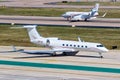 Gulfstream and Dassault Falcon private jets airplanes at Dallas Love Field airport in the United States