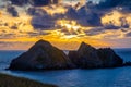 Gull rocks at sunset in Hollywell Bay in Cornwall