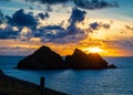 Gull rocks at sunset in Hollywell Bay in Cornwall Royalty Free Stock Photo