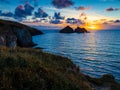 Gull rocks at sunset in Hollywell Bay in Cornwall