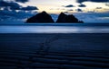 Gull rocks at sunset in Hollywell Bay in Cornwall