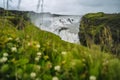 Gullfoss also known as Golden Falls waterfall and green foloage in foreground. Iceland Royalty Free Stock Photo