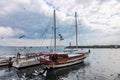 Gulls fly over fishing boats that stand at the pier in Istanbul, Turkey Royalty Free Stock Photo