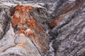 Gully in a clay slope devoid of soil