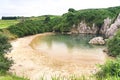 Gulpiyuri beach inland with ocean water, Asturias, Spai