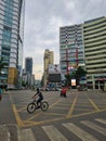 Gulshan 2, Dhaka, Bangladesh - 04.06.2023: Traffics crossing a signal in a less busy Gulshan 2 circle in Bangladesh during the