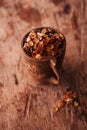 Gum arabic, also known as acacia gum - in wooden mug