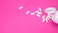 chewing gum spilled from a pack on a pink background. top view. copy space Royalty Free Stock Photo