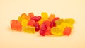 gummi bears jelly sweets closeup on yellow background Royalty Free Stock Photo