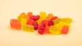gummi bears jelly sweets closeup on yellow background Royalty Free Stock Photo