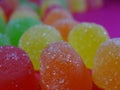 Gummies candy on a ondulated pattern closeup Royalty Free Stock Photo