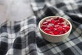 Gummy candy in a vase on checkered tablecloth