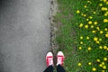 Gumshoes on urban grunge background of asphalt. Conceptual image Royalty Free Stock Photo