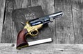 Gun and Bible. Royalty Free Stock Photo