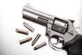 Gun with bullets on steel Royalty Free Stock Photo