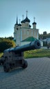 Gun and church.