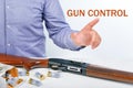 Gun Control And Regulation Concept.  Hand of male shows on Gun Control. Royalty Free Stock Photo