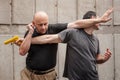 Gun Disarm. Self defense techniques against a gun point.