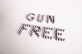 Gun free zone title made of bullets