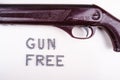 Gun free zone title made of bullets with rifle