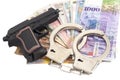 Gun, handcuffs and money Royalty Free Stock Photo