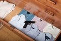 Gun hidden in a drawer full of shirt at home