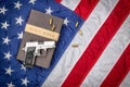 Gun on Holy Bible with American Flag Royalty Free Stock Photo