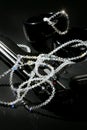 Gun and jewels over black, classic mafia image Royalty Free Stock Photo