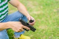 Gun man hand on green background Royalty Free Stock Photo