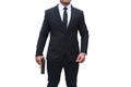 A gun man wearing a black suit is holding a gun in a stalwart pose on a white background. Concept for assassin, murder,