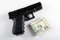 Gun and Money Royalty Free Stock Photo