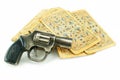 Gun and pack of cards Royalty Free Stock Photo